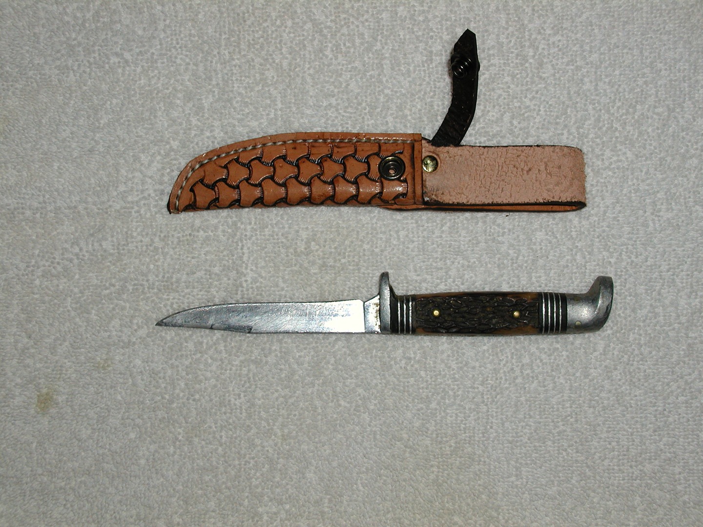 Knife Sheath With Geometric Stamp, Keeper Strap With Snap And Machine Sewn