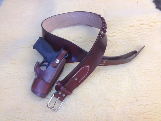 Holster and ammo belt for a semi-auto hand gun